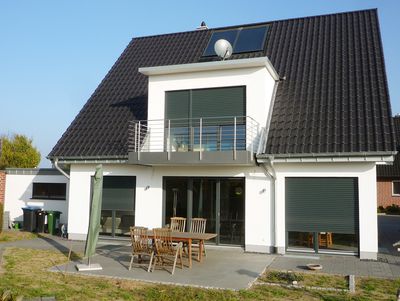 Einfamilienhaus in Verl, Putz, Satteldach