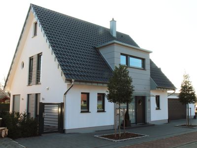 Einfamilienhaus in Verl, Putz, Satteldach